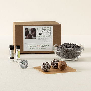 Truffles and Ingredients with Deluxe Chocolate Truffle Making Kit in Background