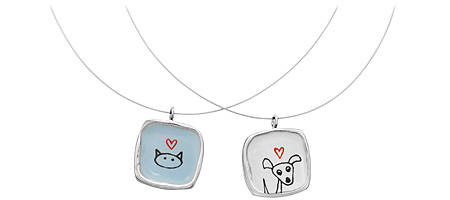 REVERSIBLE CAT DOG NECKLACE - UncommonGoods from uncommongoods.com