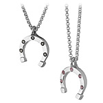 HORSE SHOE NECKLACE | Vanessa Raptopoulos Horseshoe Pendant With Black Diamonds And Pink Sapphires | UncommonGoods from uncommongoods.com
