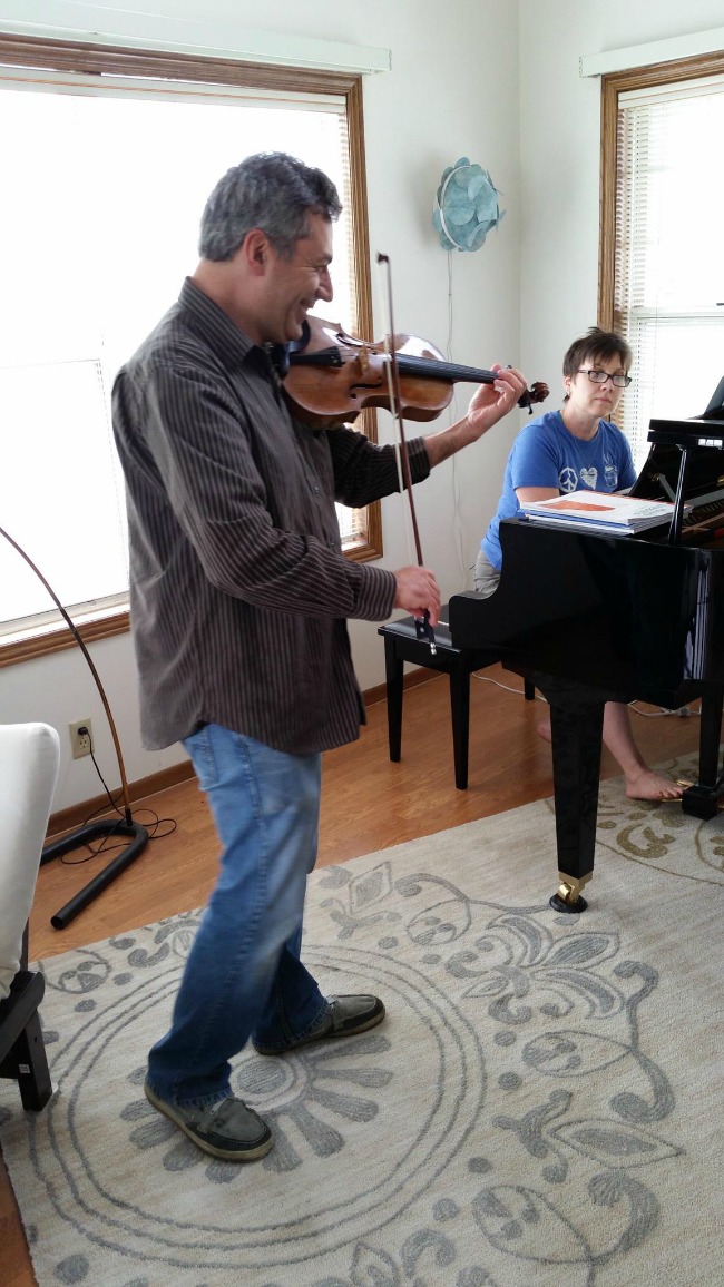 John Playing Violin