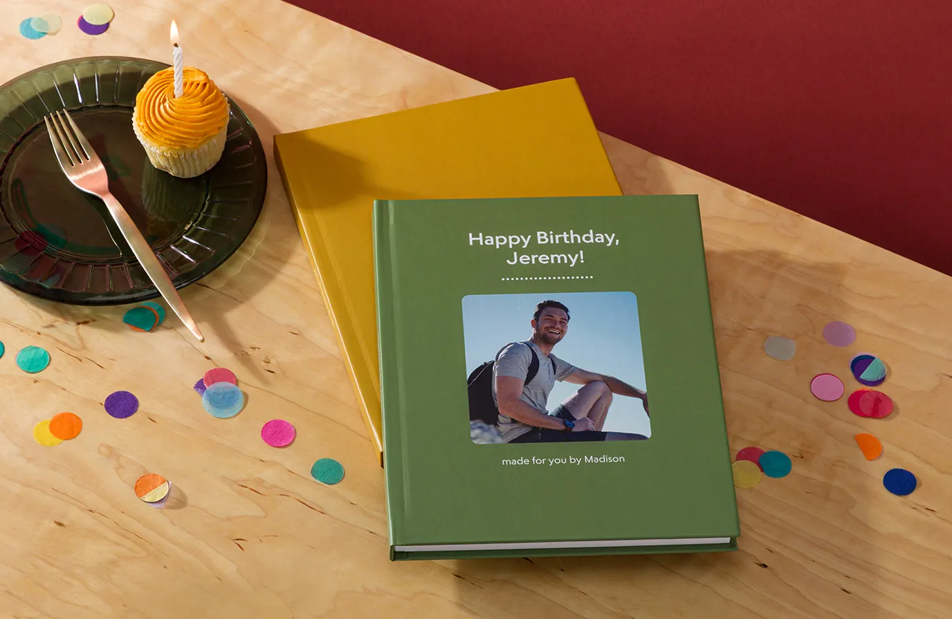 Three printed books with different titles, authors, and cover colors.