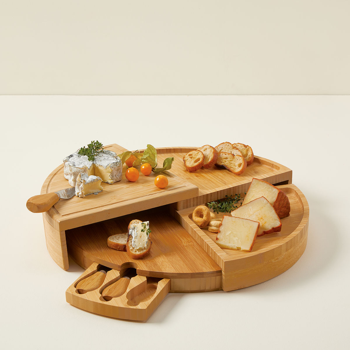 Compact Swivel Cheese Board with Knives | cheese knives | UncommonGoods